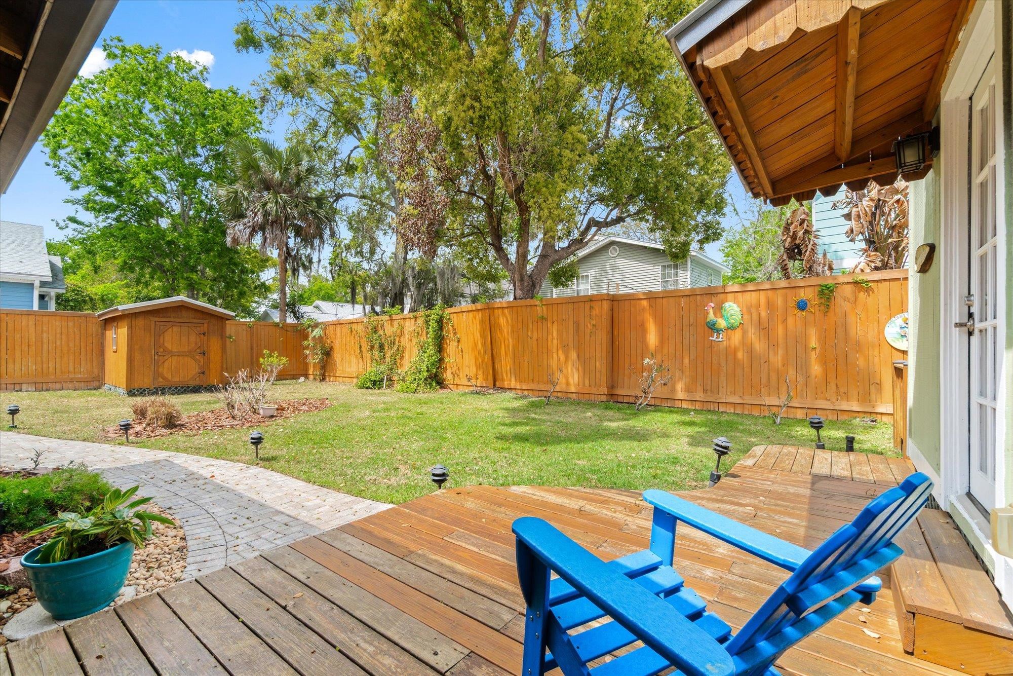 68 Kings Ferry Way St. Augustine, FL 32084 - Photo 32 of 52 Wooden Deck featuring a fenced backyard and a shed