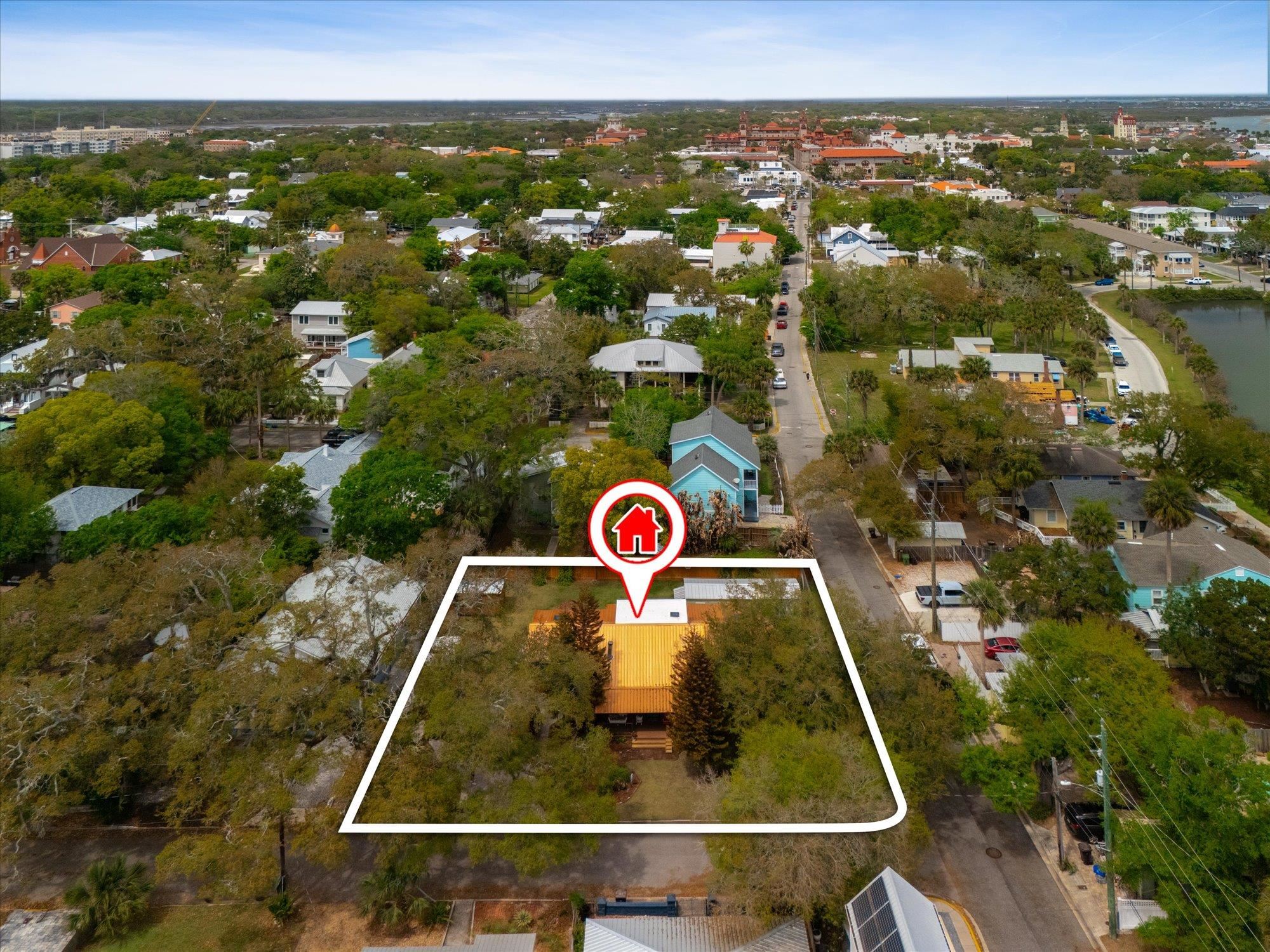 68 Kings Ferry Way St. Augustine, FL 32084 - Photo 49 of 52 Aerial view of property's location featuring property parcel outlined and nearby suburban area
