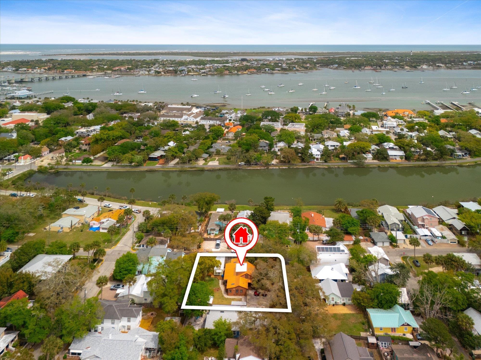 68 Kings Ferry Way St. Augustine, FL 32084 - Photo 51 of 52 Aerial view of property's location with nearby suburban area, property boundaries highlighted, and a nearby body of water
