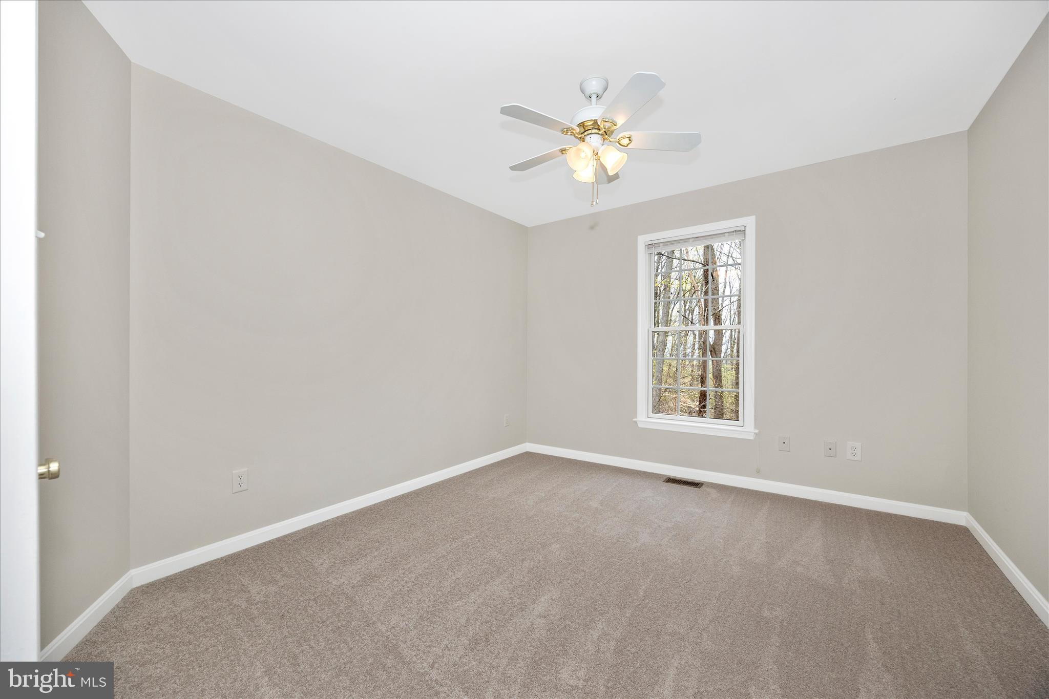 10393 Liberty Road Frederick, MD 21701 - Photo 12 of 47 a view of an empty room with a window