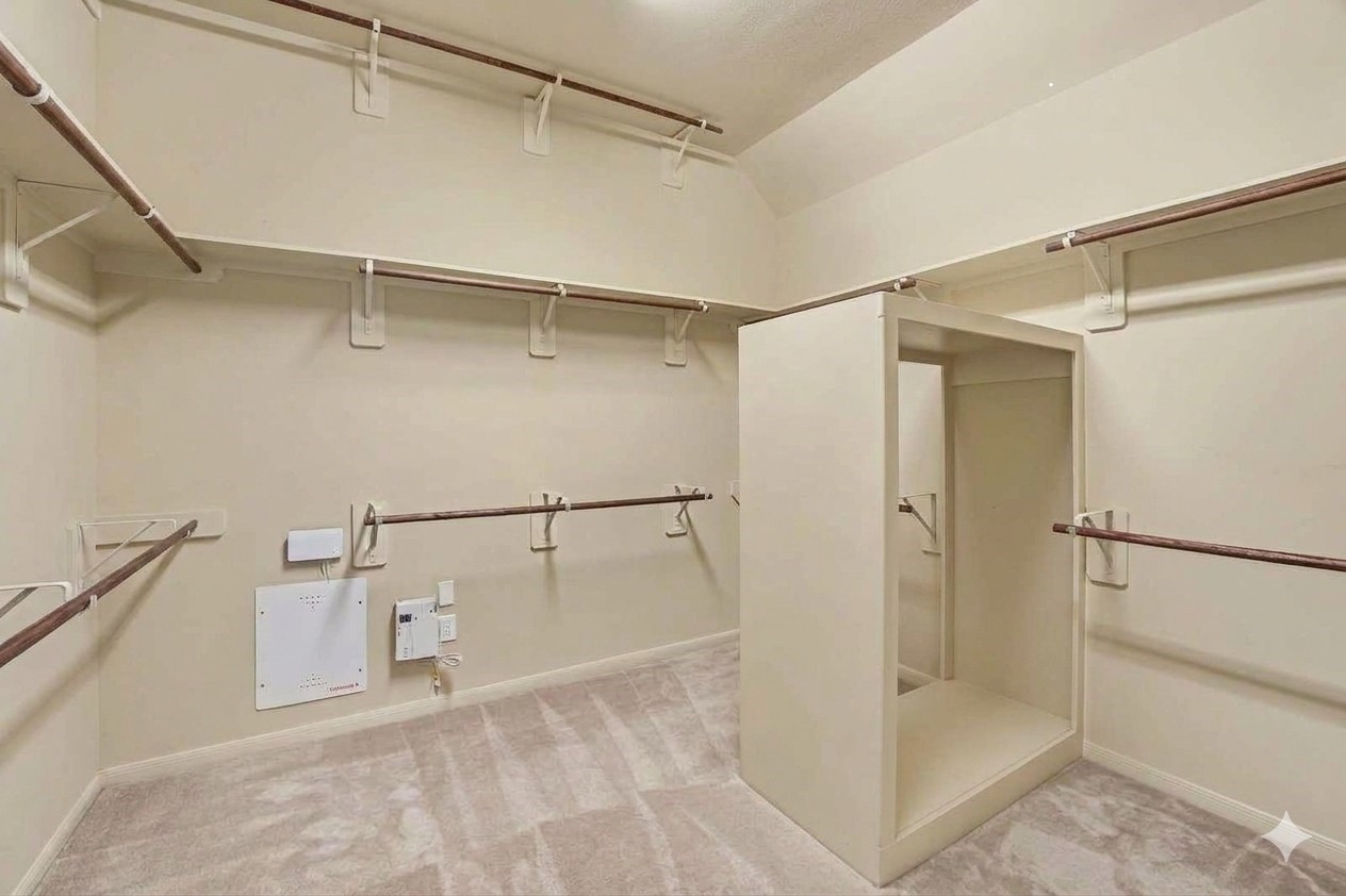 62 Sandwell Place Spring, TX 77389 - Photo 24 of 50 No storage issues here with this massive primary closet.