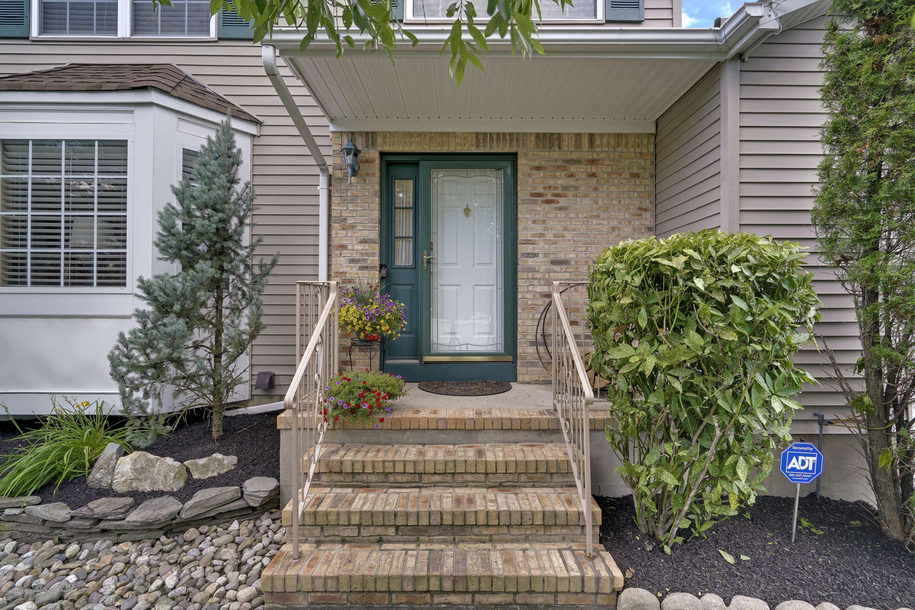 689 Line Road Matawan, NJ 07747 - Photo 3 of 25 a front view of a house with garden
