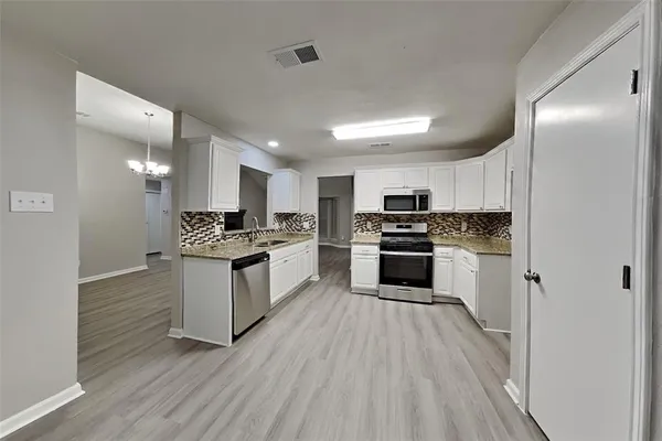 $2,075 | 2221 Tangleridge Lane, Rowlett, TX 75088