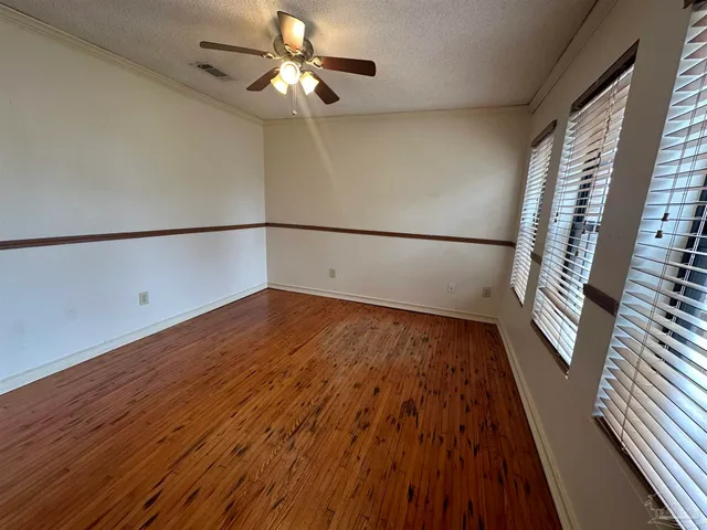 wooden floor with staircase