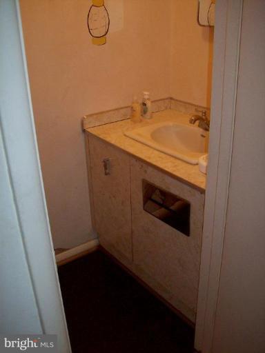 4203 Crest Heights Road Baltimore, MD 21215 - Photo 5 of 12 Half Bath 1