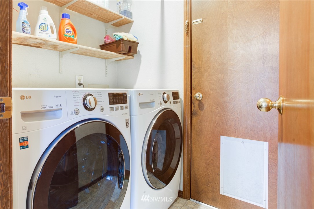 2525 166th Place Southeast Bothell, WA 98012 - Photo 23 of 25 a utility room with dryer and washer