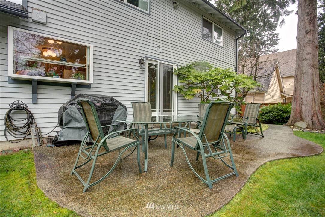 2525 166th Place Southeast Bothell, WA 98012 - Photo 6 of 25 a view of a patio with table and chairs