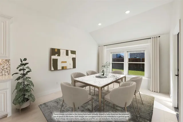 a dining room with furniture and window