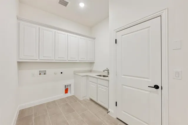 a view of cabinets and window