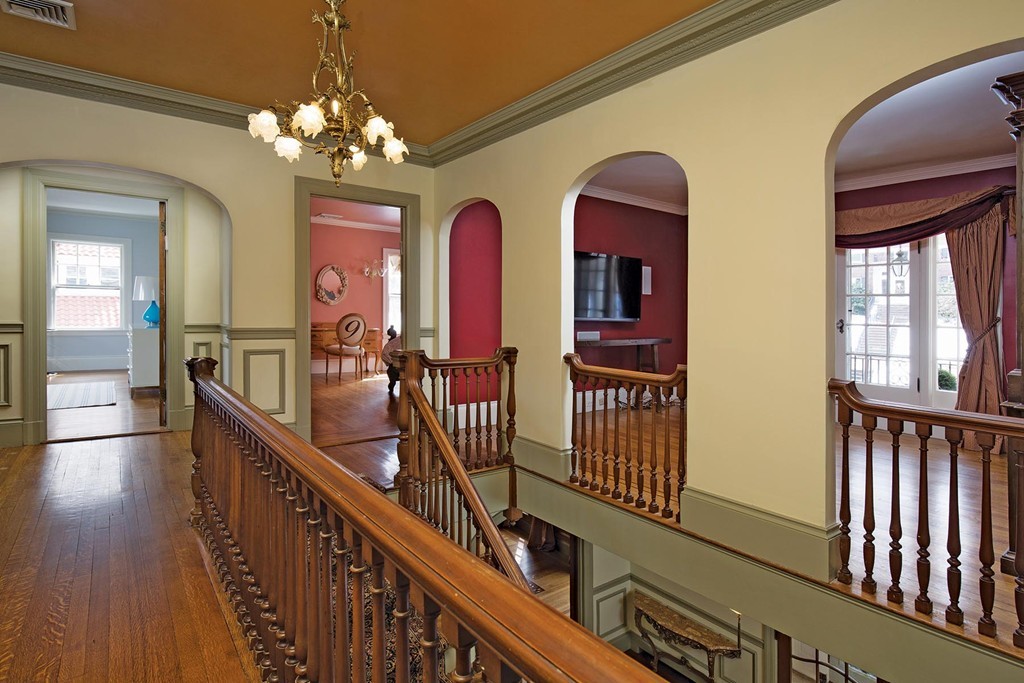 95 Clinton Road Brookline, MA 02445 - Photo 11 of 19 a view of a balcony with furniture and chandelier