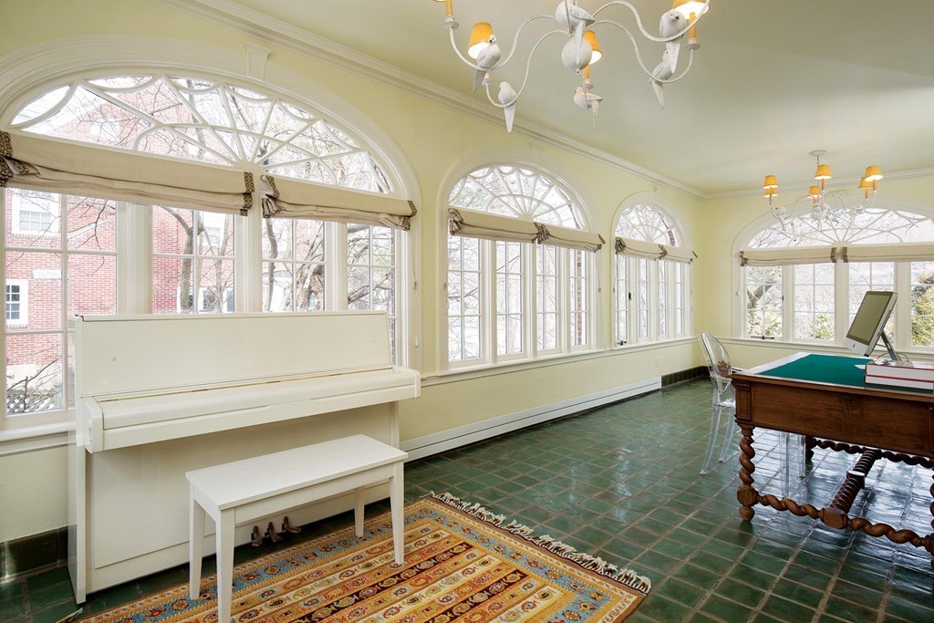 95 Clinton Road Brookline, MA 02445 - Photo 10 of 19 a living room with furniture and a large window
