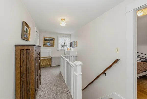 a view of a hallway with workspace