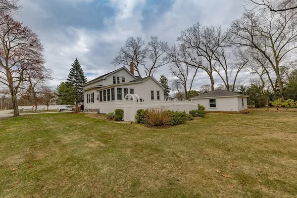 a view of a house with a big yard