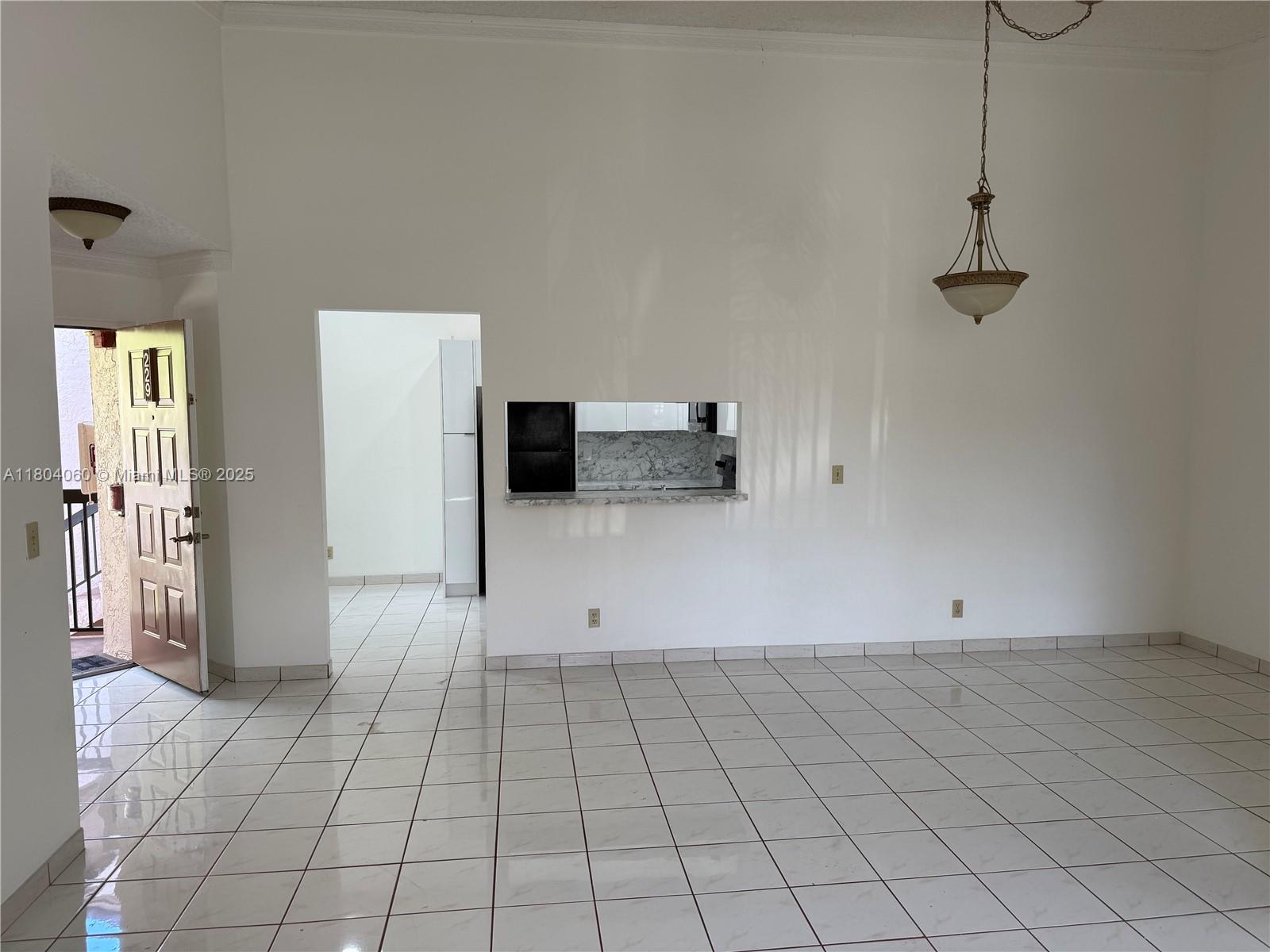 10631 Northwest 14th Street, Unit 229 Plantation, FL 33322 - Photo 2 of 12 a view of a livingroom with wooden floor