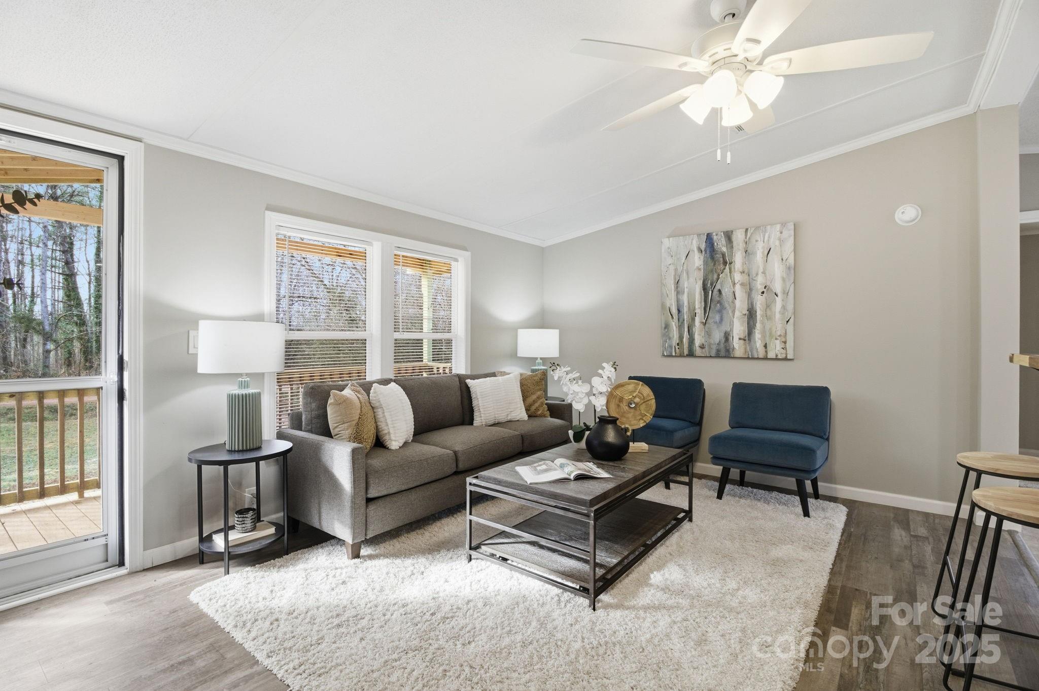 a living room with furniture and a window