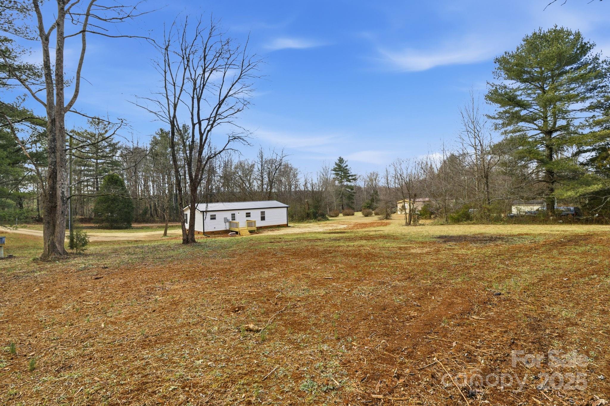 2501 Swanson Road Crouse, NC 28033 - Photo 16 of 22 a view of outdoor space with swimming pool and trees