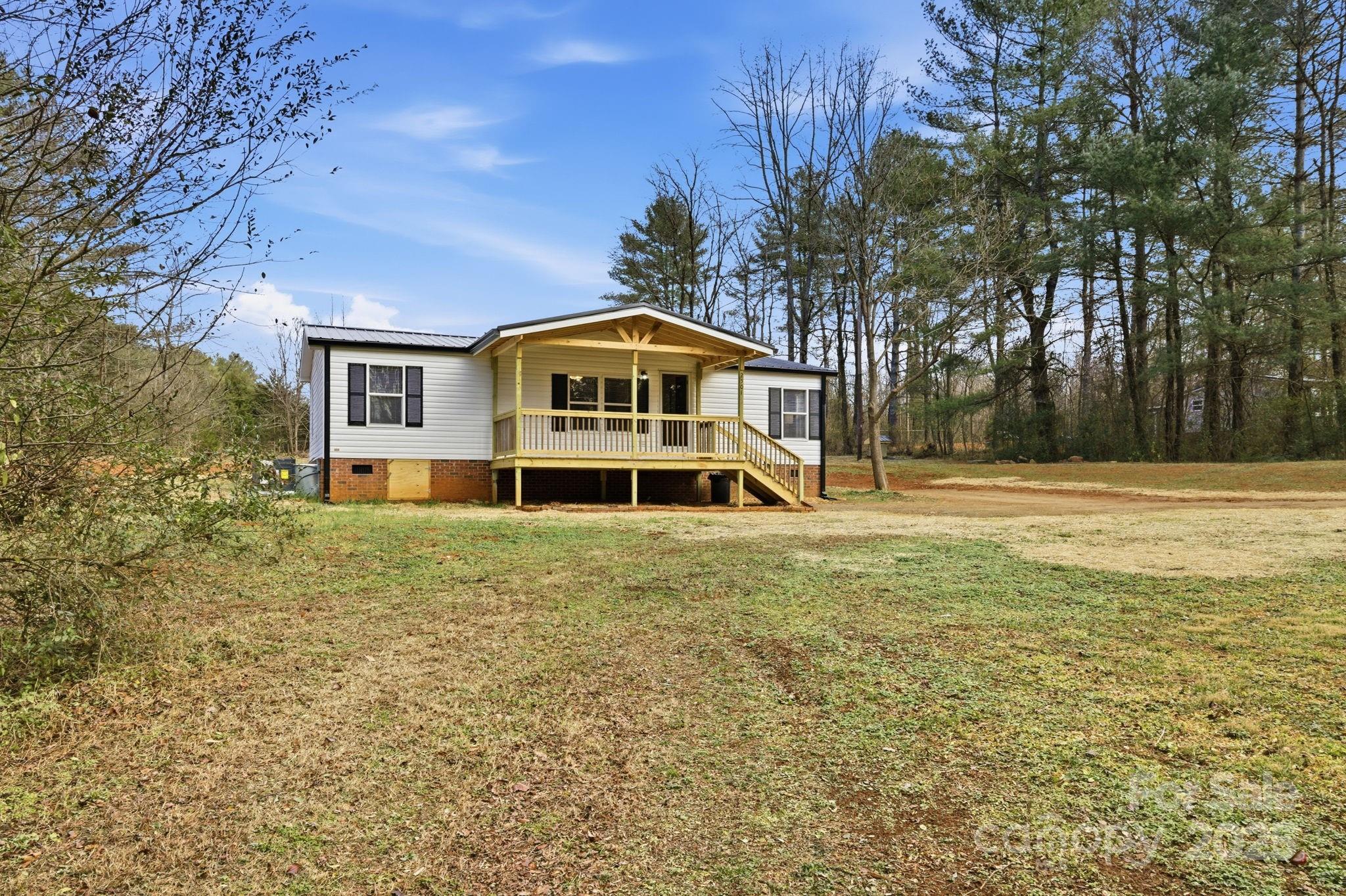 2501 Swanson Road Crouse, NC 28033 - Photo 22 of 22 a front view of a house with a yard