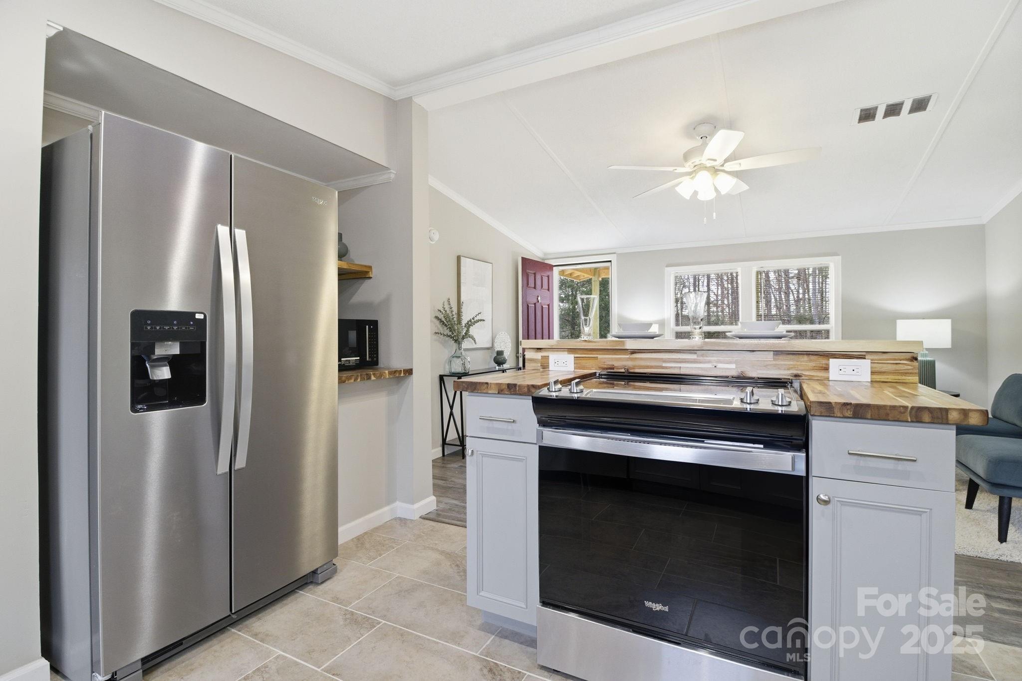 2501 Swanson Road Crouse, NC 28033 - Photo 3 of 22 a kitchen with stainless steel appliances granite countertop a stove and a refrigerator