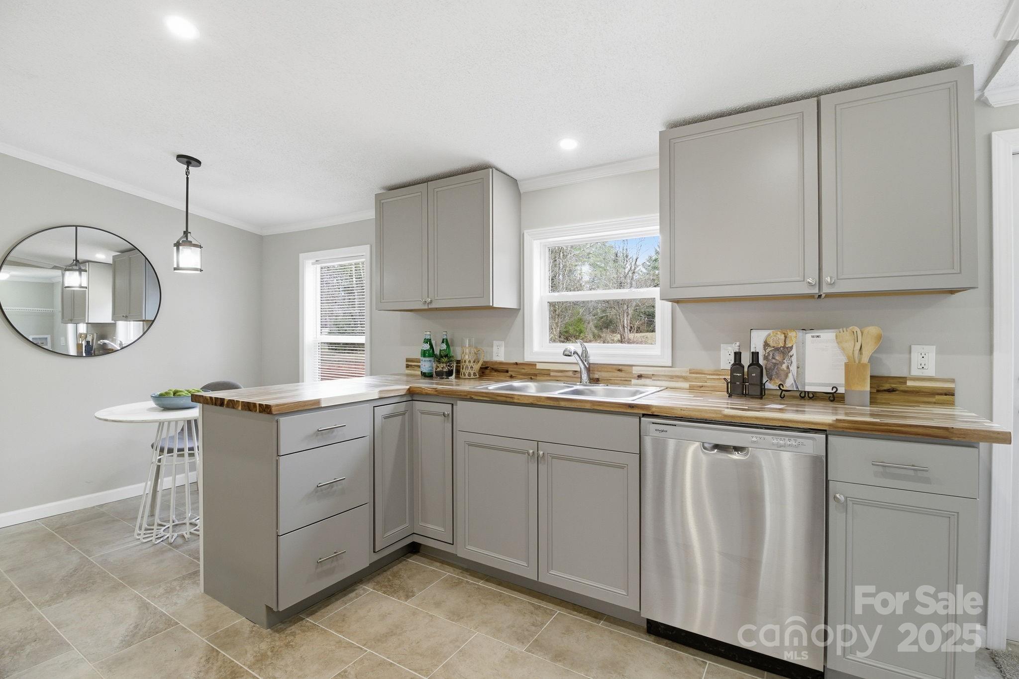 2501 Swanson Road Crouse, NC 28033 - Photo 4 of 22 a kitchen with sink cabinets and window