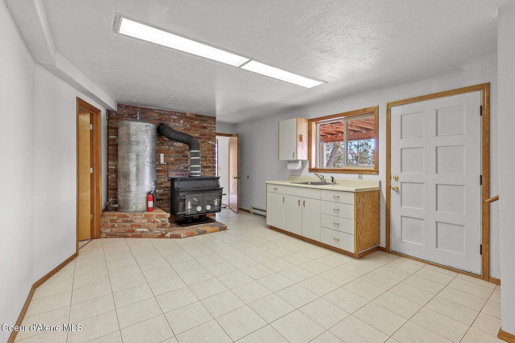5977 East McMahon Road Hayden, ID 83835 - Photo 28 of 39 Basement Kitchenette
