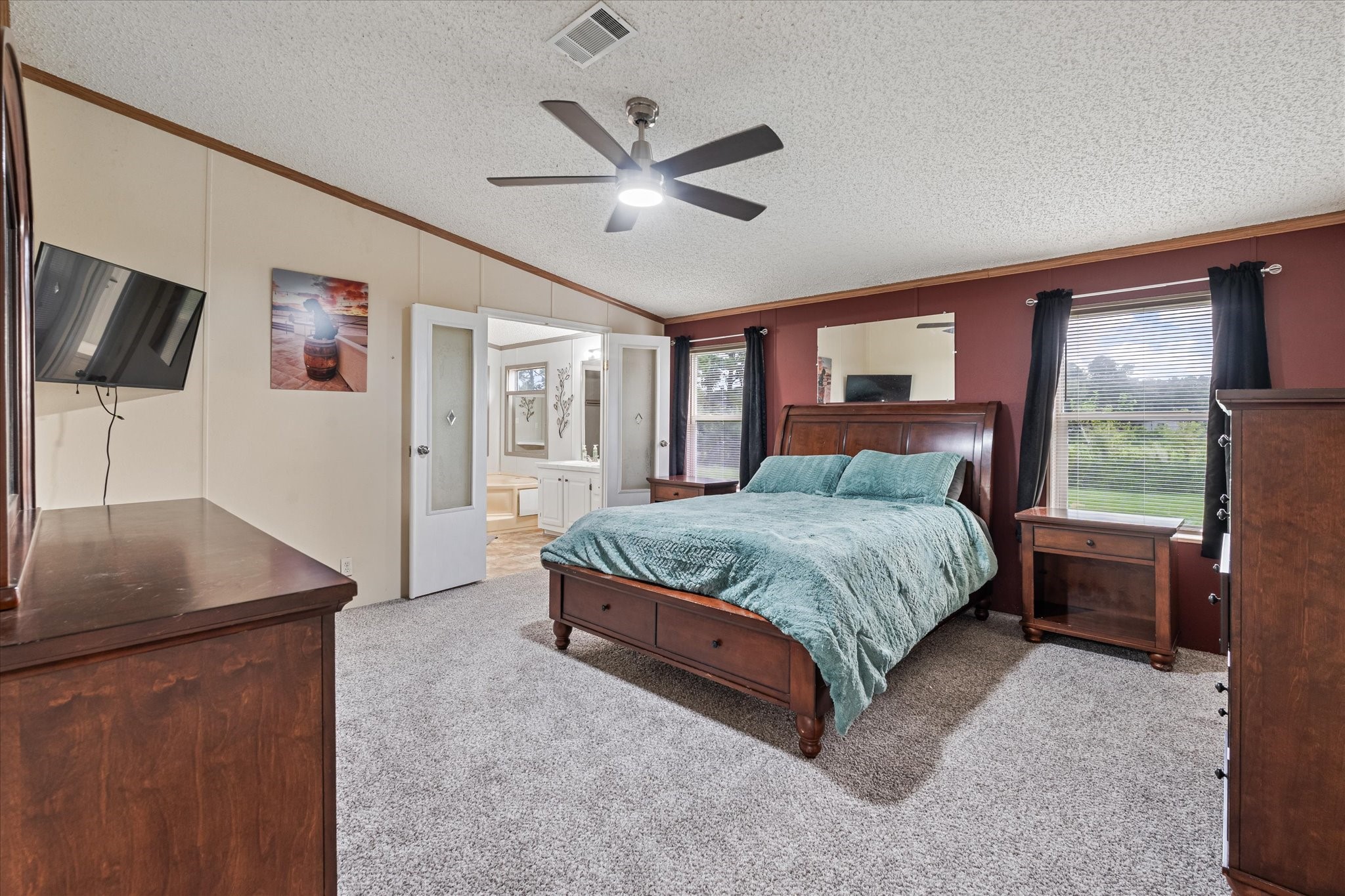 1715 Meyer Road Beasley, TX 77417 - Photo 19 of 41 Spacious primary suite with new plush carpet.