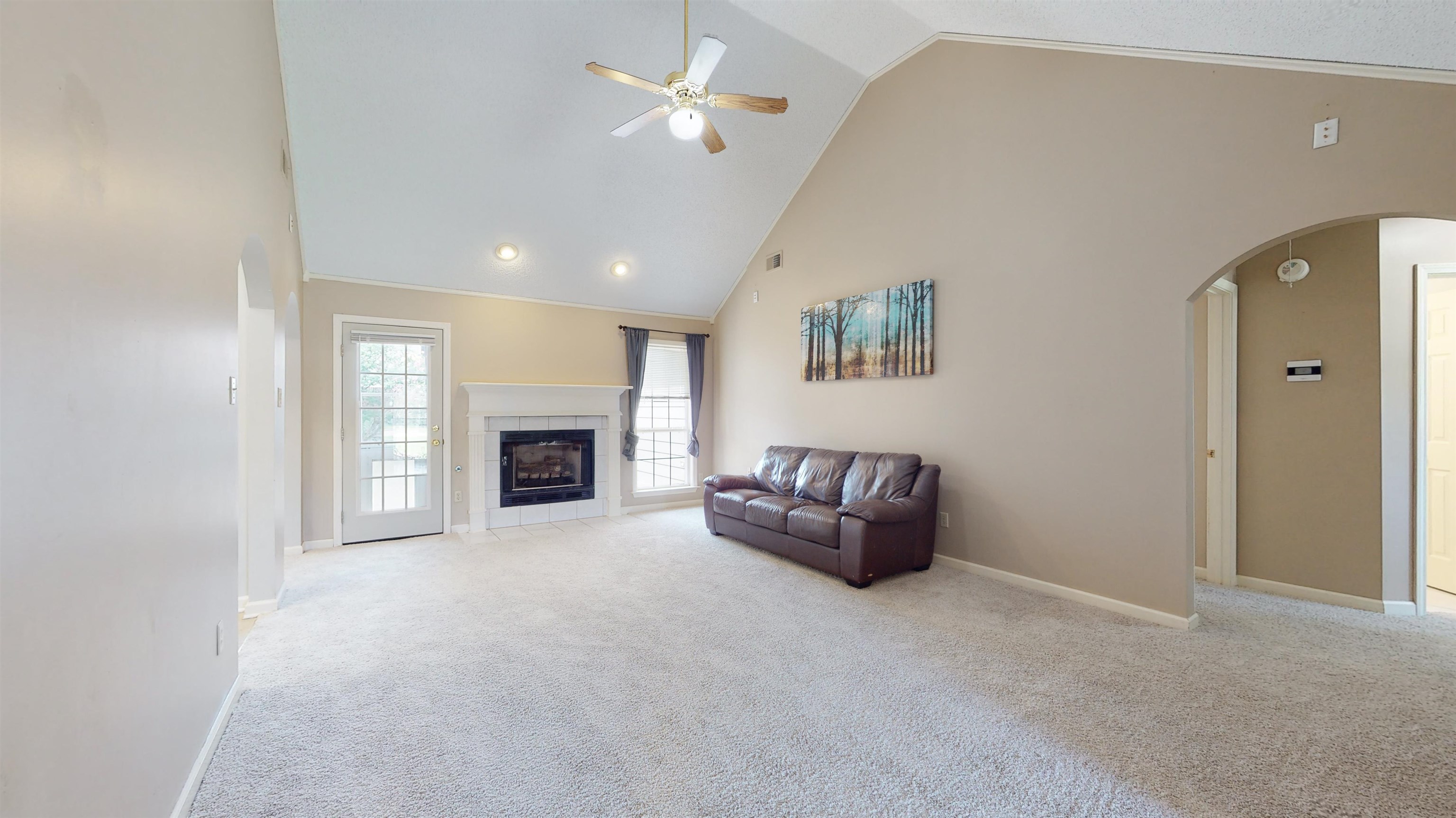 195 Cross Point Drive Collierville, TN 38017 - Photo 14 of 40 a living room with furniture and a fireplace