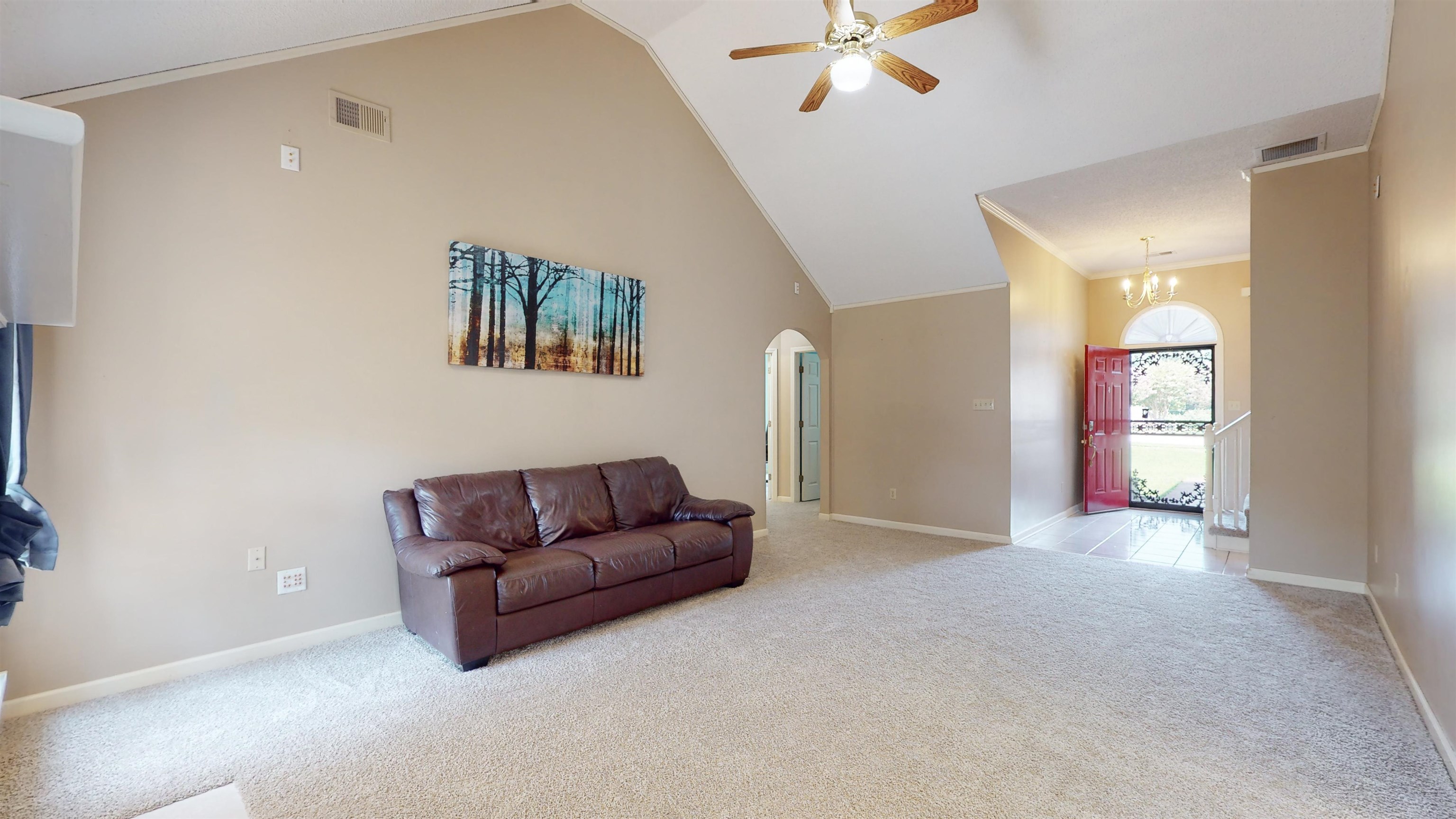 195 Cross Point Drive Collierville, TN 38017 - Photo 16 of 40 a living room with furniture and a ceiling fan