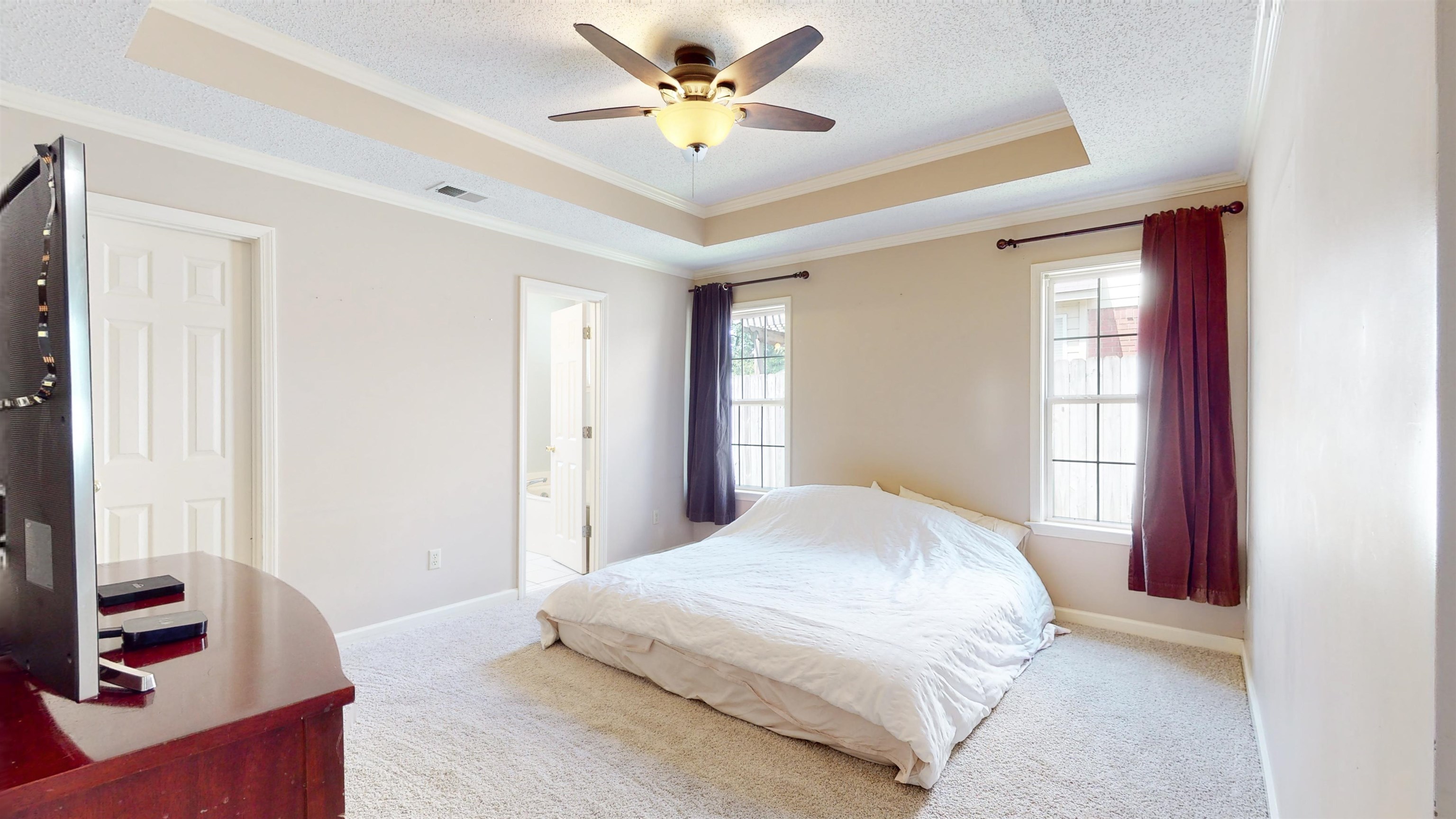 195 Cross Point Drive Collierville, TN 38017 - Photo 19 of 40 a bedroom with a bed and a window