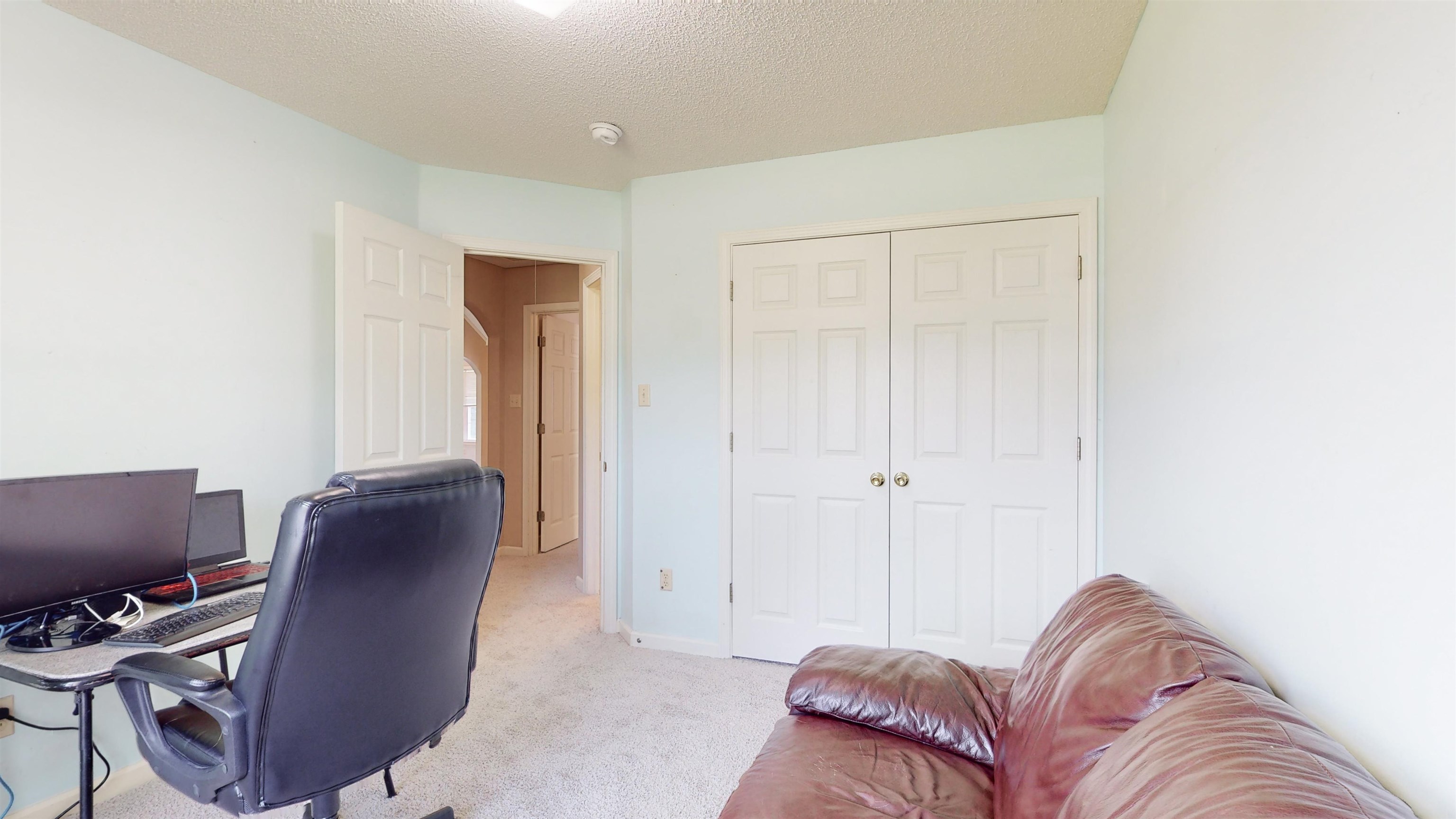 195 Cross Point Drive Collierville, TN 38017 - Photo 30 of 40 a living room with furniture and a chair