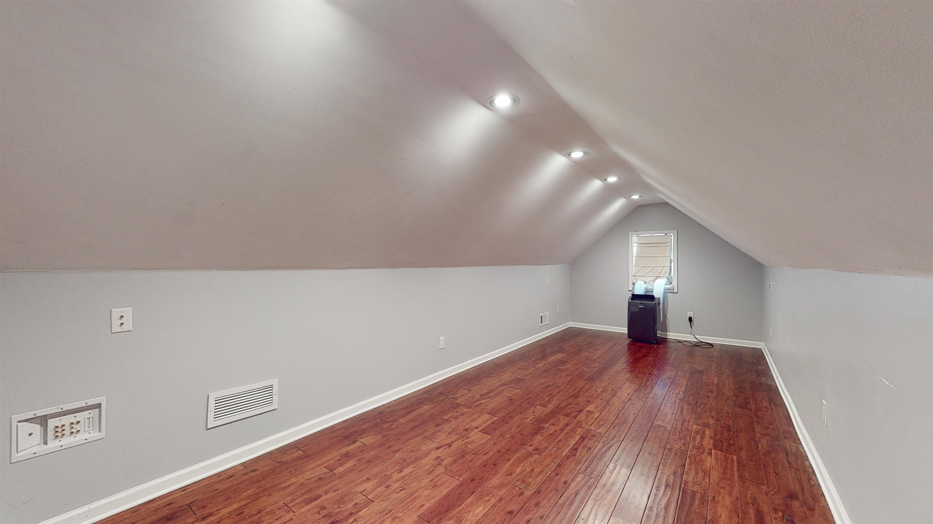 195 Cross Point Drive Collierville, TN 38017 - Photo 31 of 40 a view of an empty room with wooden floor and a window