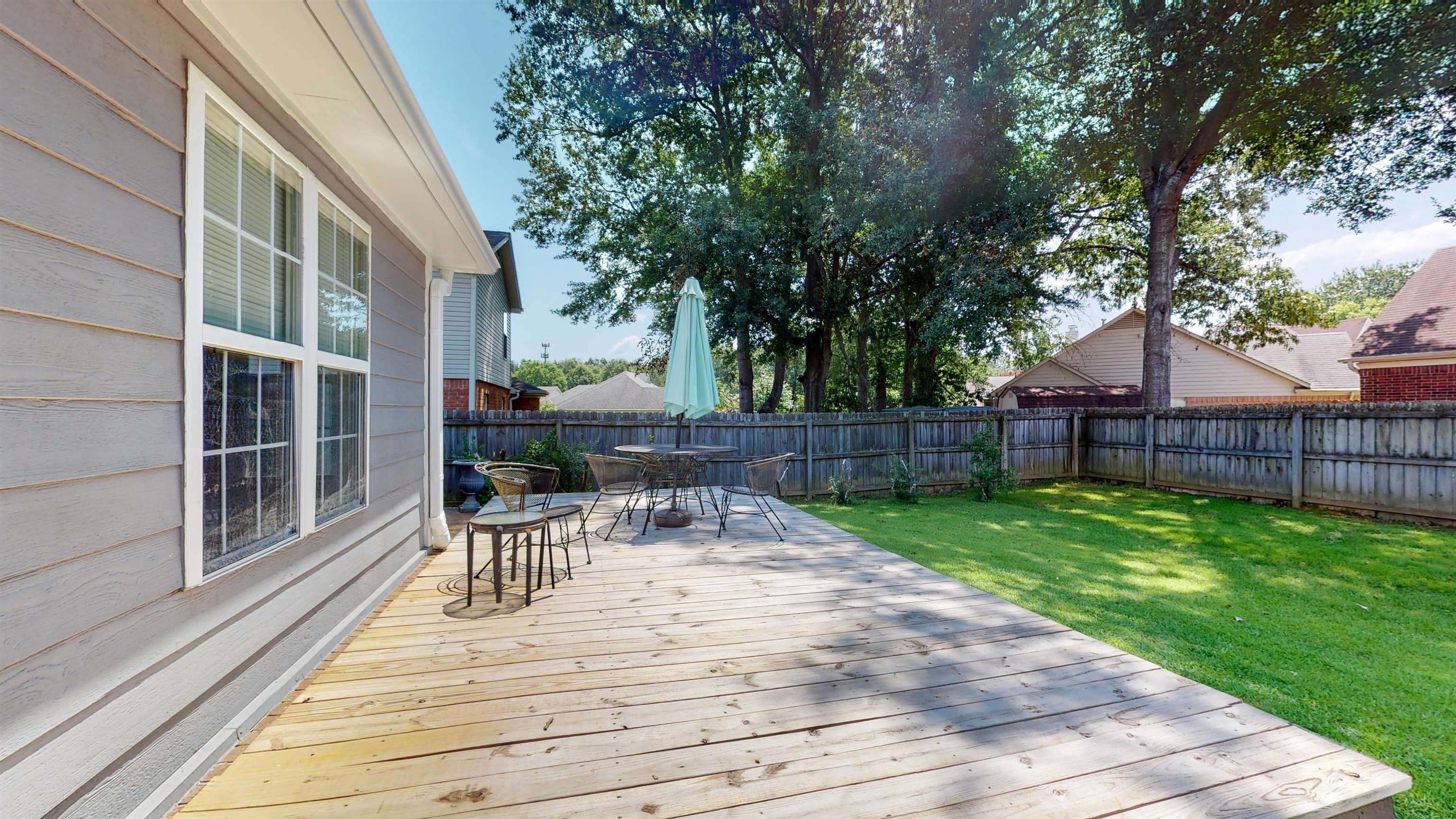195 Cross Point Drive Collierville, TN 38017 - Photo 36 of 40 a view of backyard with deck and seating space