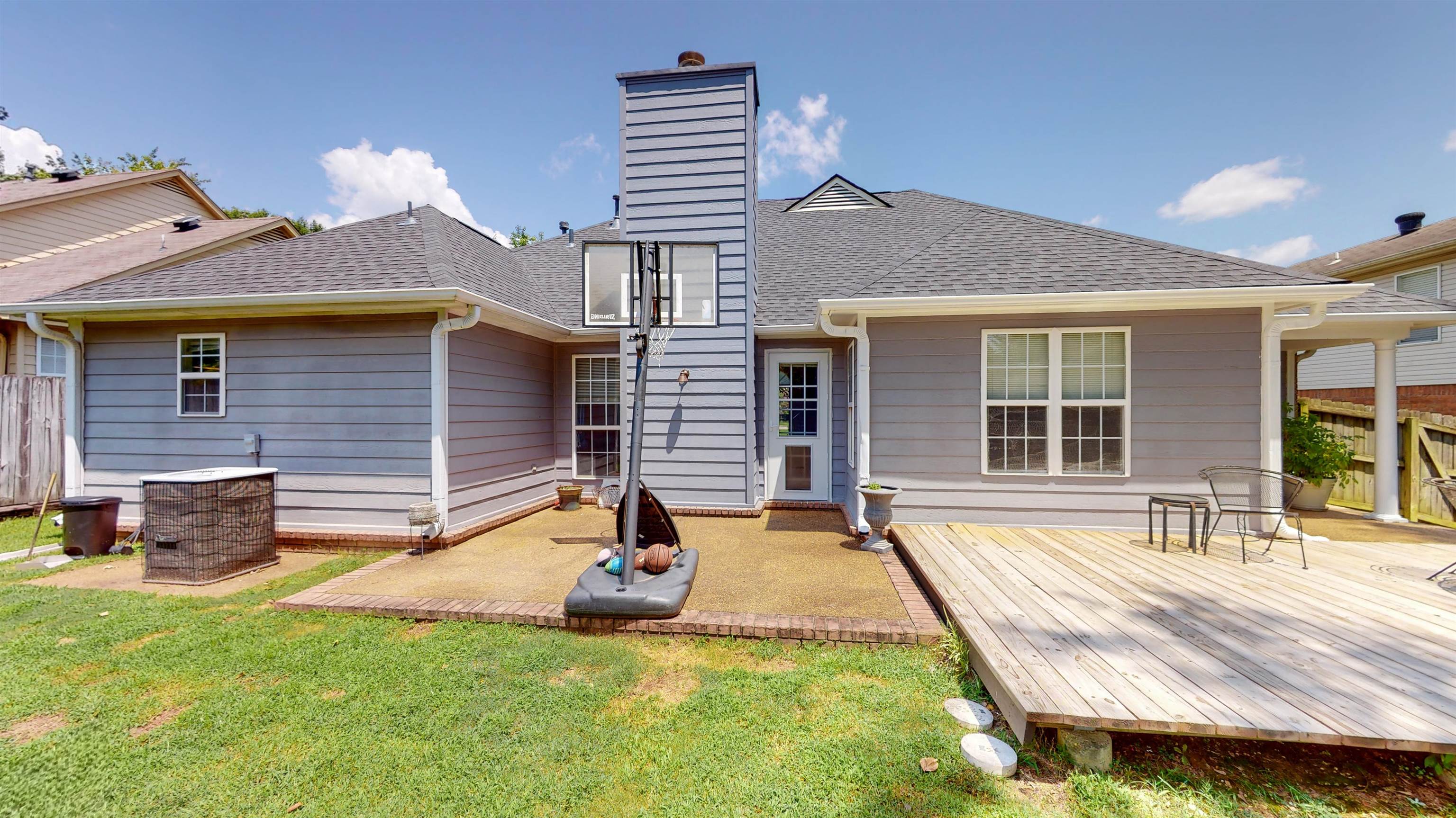 195 Cross Point Drive Collierville, TN 38017 - Photo 37 of 40 a front view of a house with a yard outdoor seating and barbeque oven