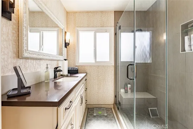 a view of a house with a yard and deck