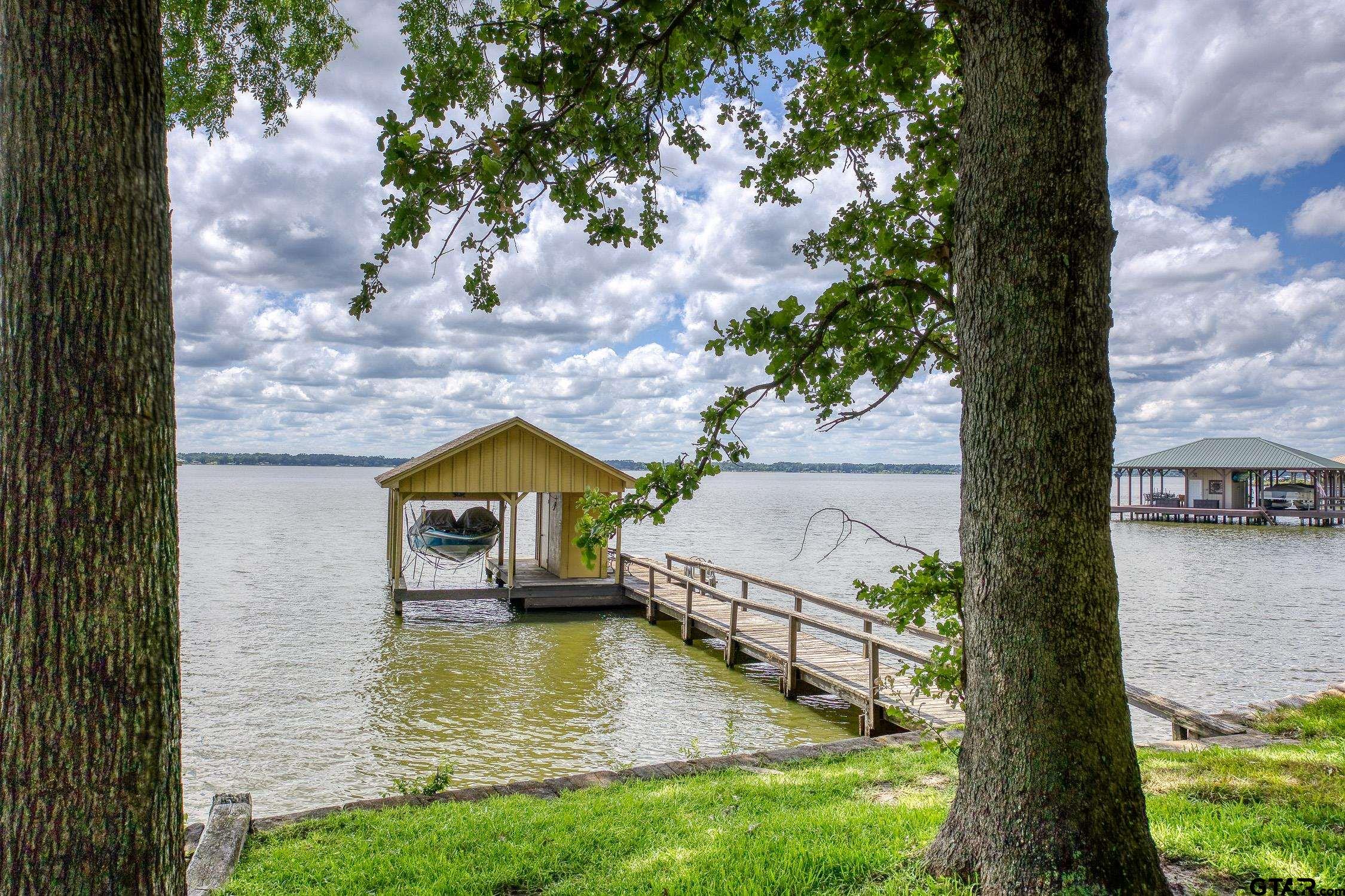 17553 Sleepy Hollow Way Flint, TX 75762 - Photo 1 of 41 a view of houses with yard in back