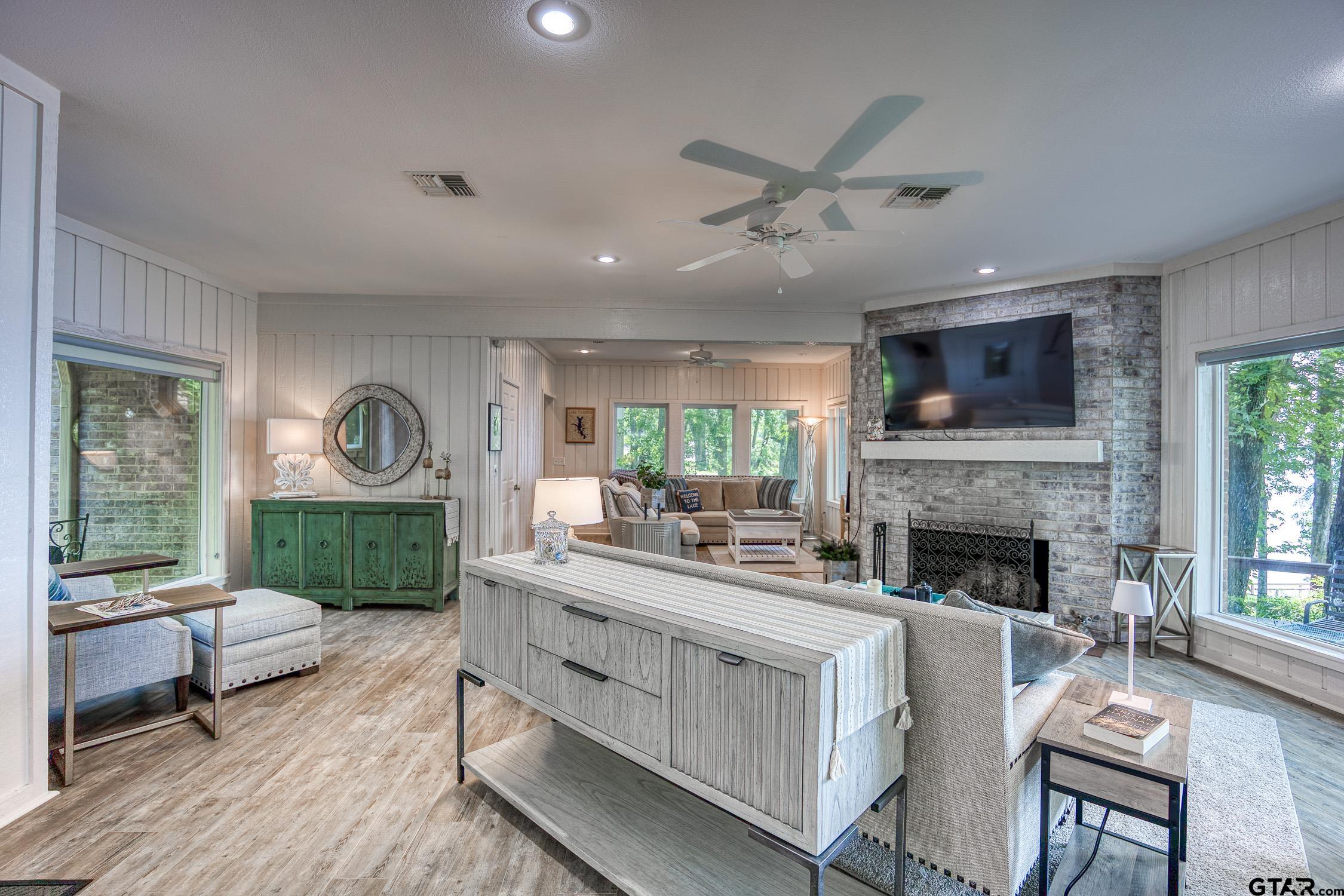 17553 Sleepy Hollow Way Flint, TX 75762 - Photo 12 of 41 a living room with furniture fireplace and a flat screen tv