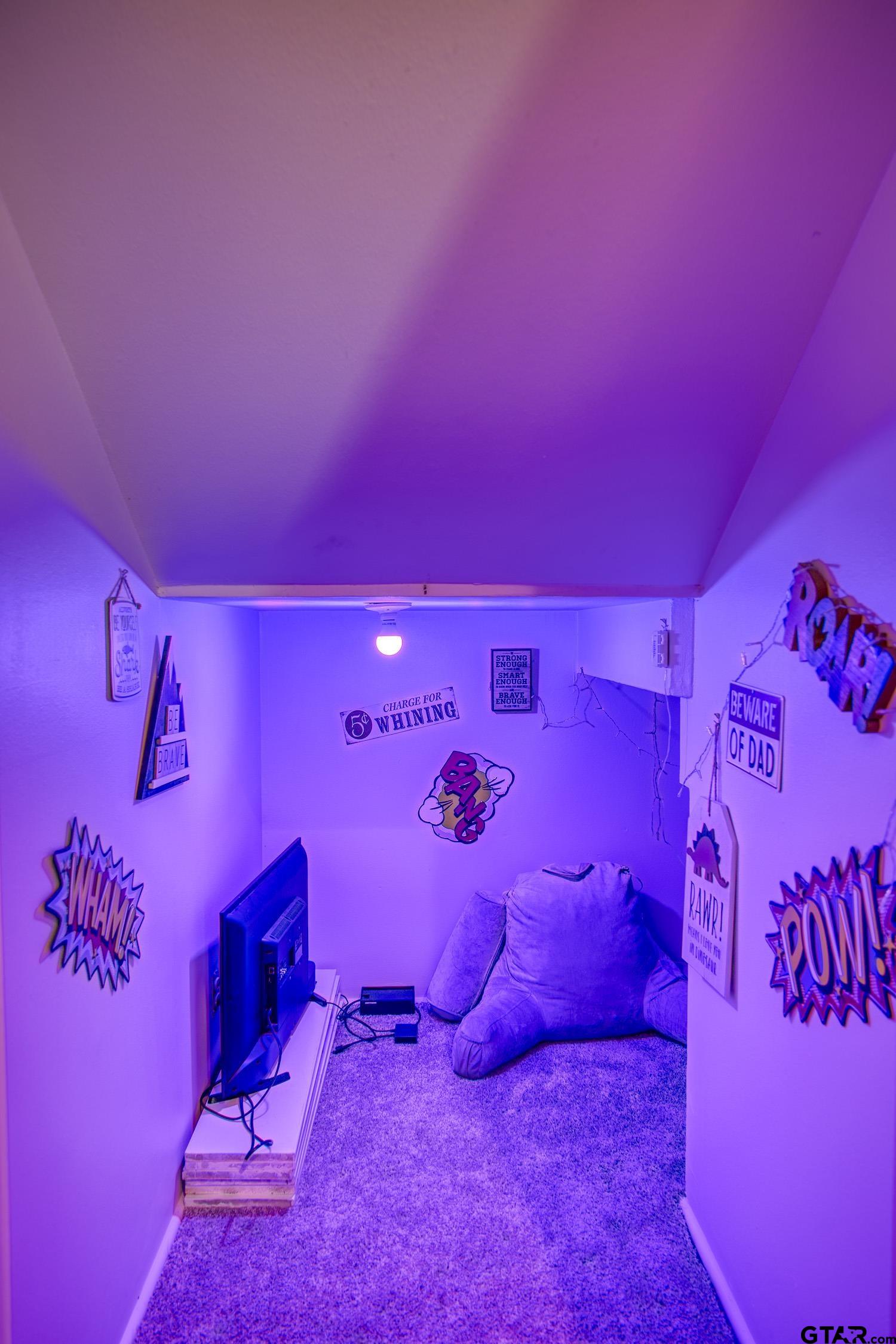 17553 Sleepy Hollow Way Flint, TX 75762 - Photo 22 of 41 a bed room with a bed and a couch