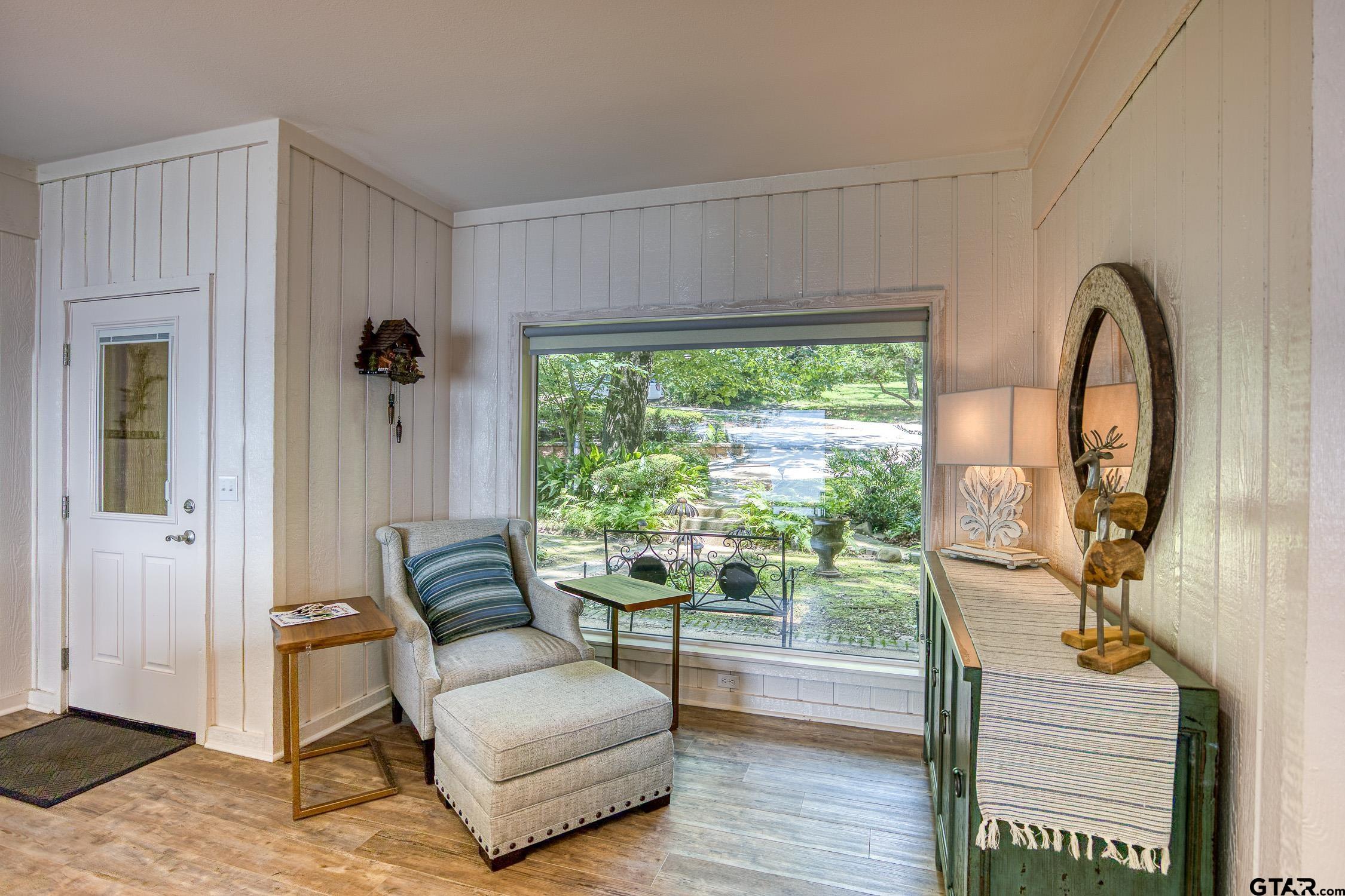 17553 Sleepy Hollow Way Flint, TX 75762 - Photo 8 of 41 a living room with furniture and a large window