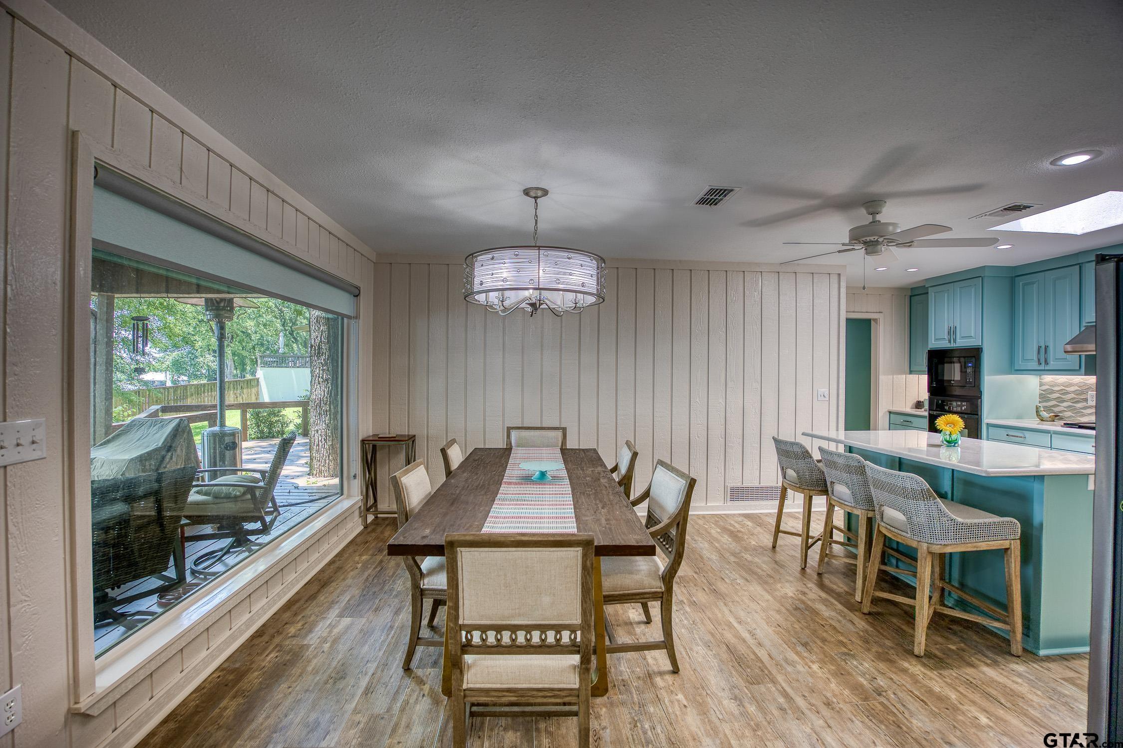 17553 Sleepy Hollow Way Flint, TX 75762 - Photo 10 of 41 a view of a dining room with furniture window and wooden floor