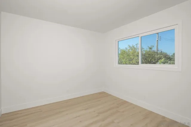 a view of a room that has a window in it