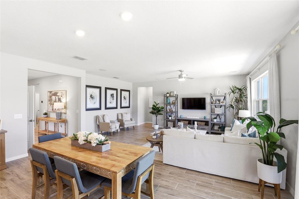 740 Rioja Drive Minneola, FL 34715 - Photo 17 of 33 a living room with furniture and a flat screen tv
