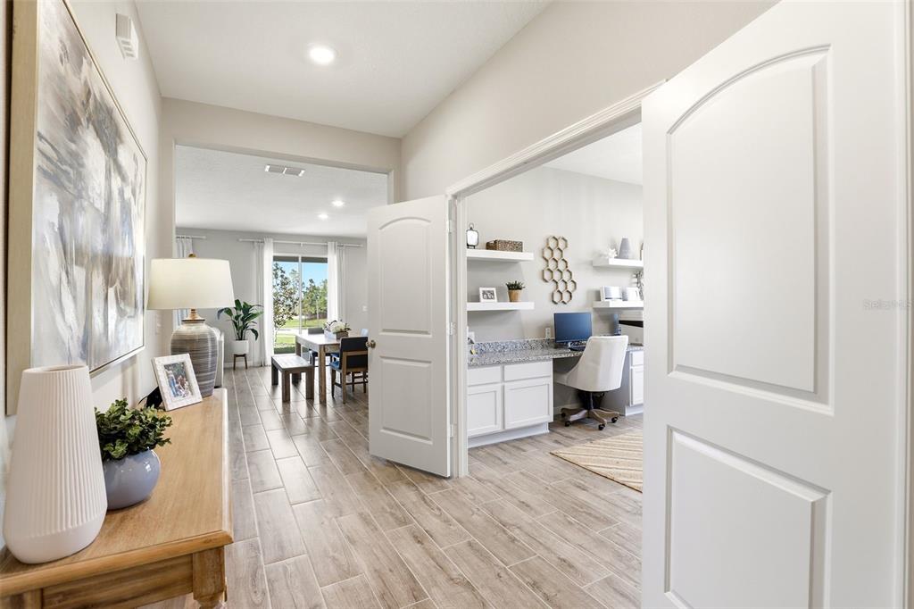740 Rioja Drive Minneola, FL 34715 - Photo 5 of 33 a living room with furniture and a table