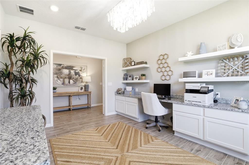 740 Rioja Drive Minneola, FL 34715 - Photo 10 of 33 a room with cabinets and window