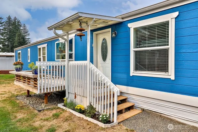 a front view of a house with a porch