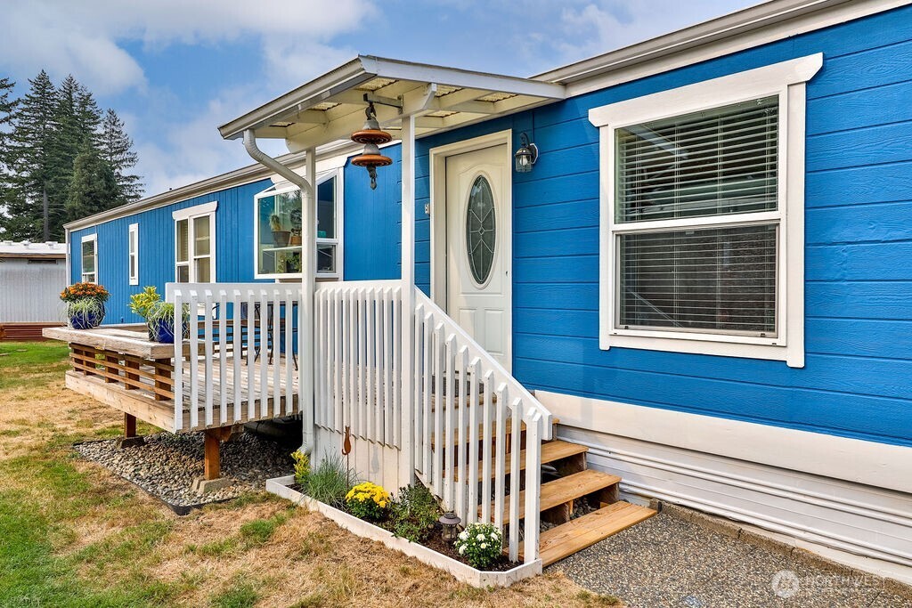 43010 Southeast North Bend Way, Unit 53 North Bend, WA 98045 - Photo 1 of 19 a front view of a house with a porch