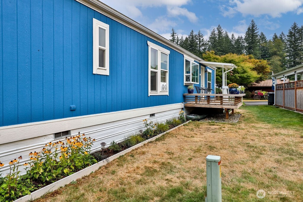 43010 Southeast North Bend Way, Unit 53 North Bend, WA 98045 - Photo 15 of 19 a front view of a house with garden