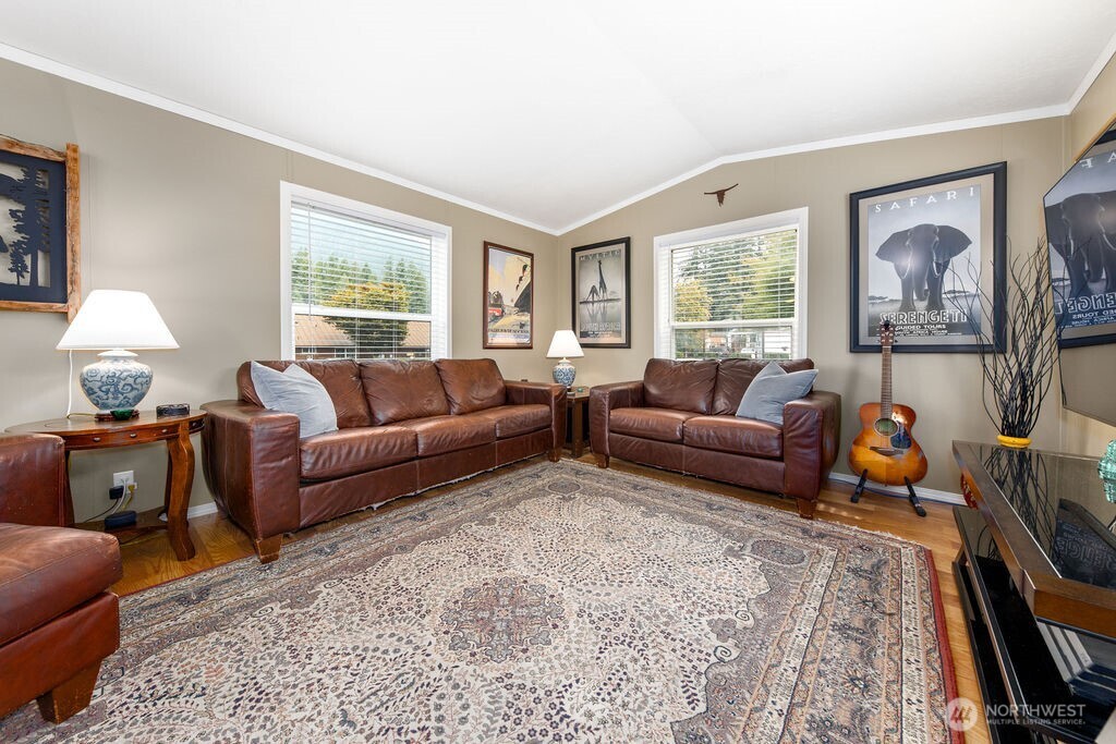 43010 Southeast North Bend Way, Unit 53 North Bend, WA 98045 - Photo 4 of 19 a living room with furniture and a window