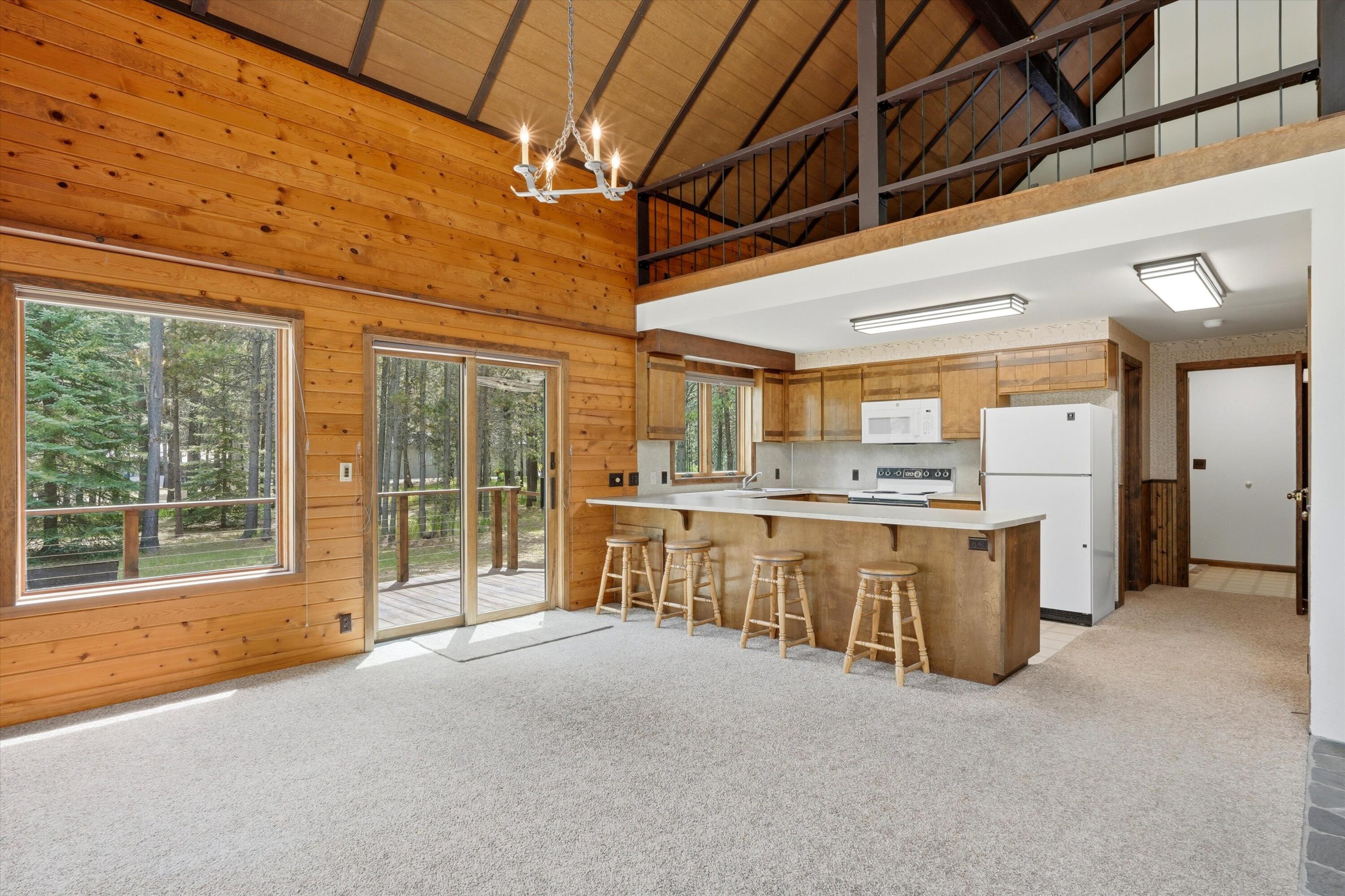 56446 Eclipse Drive Bend, OR 97707 - Photo 14 of 42 a large room with a large window