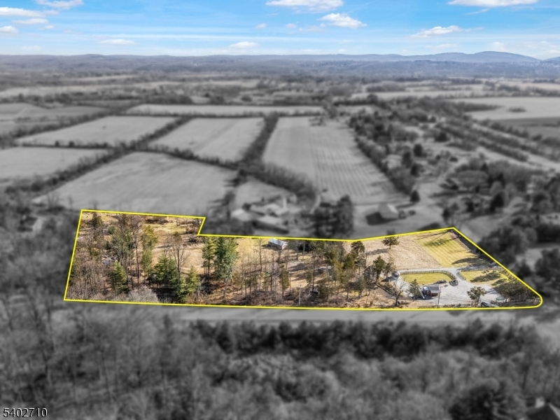 a view of swimming pool with outdoor seating