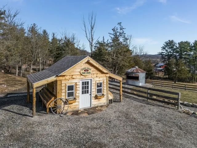 an aerial view of residential house with outdoor space