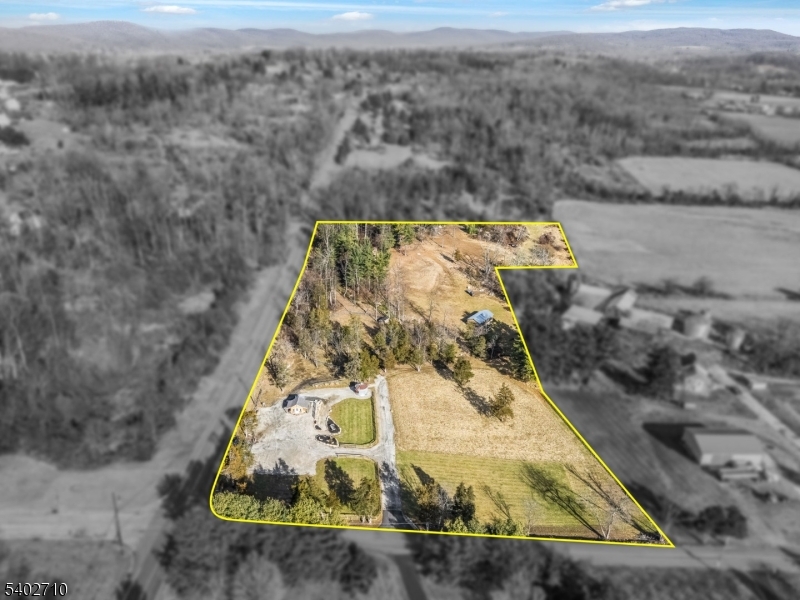 133 Cemetery Hill Road Washington, NJ 07882 - Photo 4 of 30 an aerial view of a house with a yard